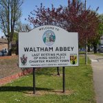 (photo: 'Welcome to Waltham Abbey' sign)