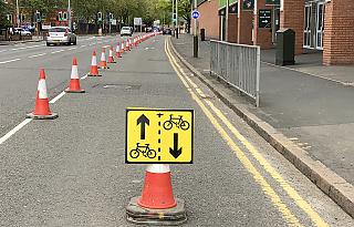 [photo of pop-up protected bike track]